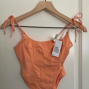 Orange corset top with tie straps